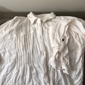 Long sleeved cream blouse